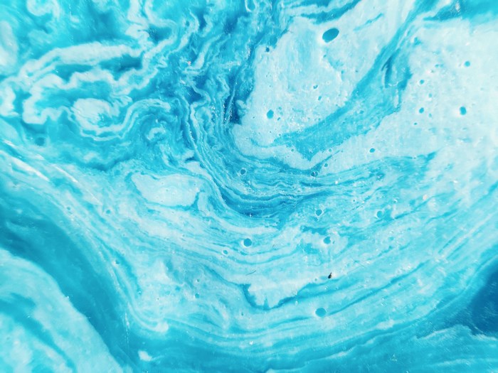 Abstract blue and white marbled soap texture