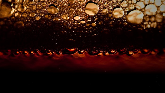 Close up of brown bubbles and liquid