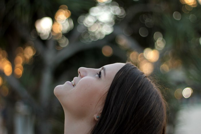 Girl smiling with bokeh background