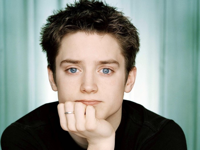 Elijah Wood with blue eyes and a ring