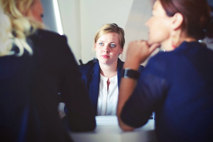Three women in a business meeting
