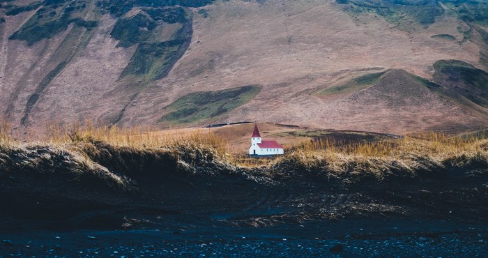 White church with red roof in Iceland
