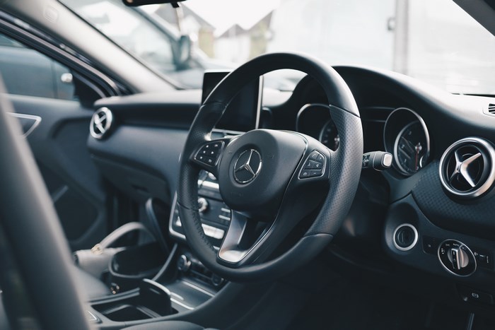 Mercedes-Benz car interior with steering wheel
