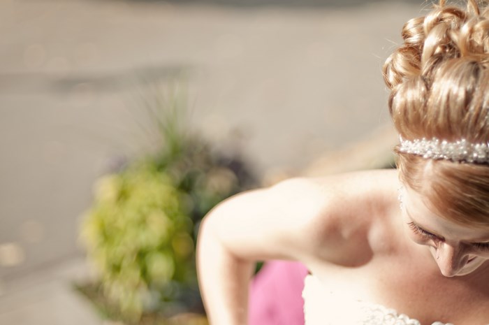 Bride with blonde curly updo and tiara