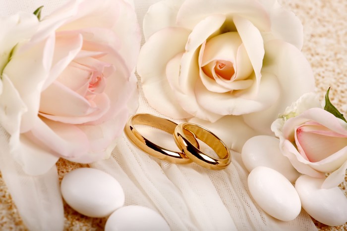 Wedding Rings with Roses and Confetti