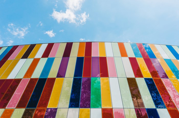 Colorful facade of a building against a blue sky