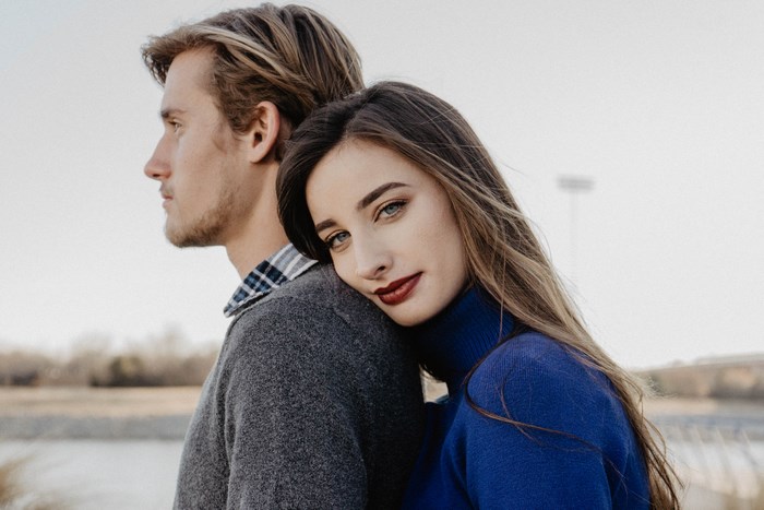 Couple embracing outdoors