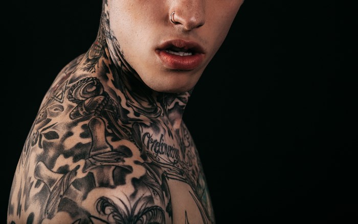 Tattooed Man with Nose Piercing