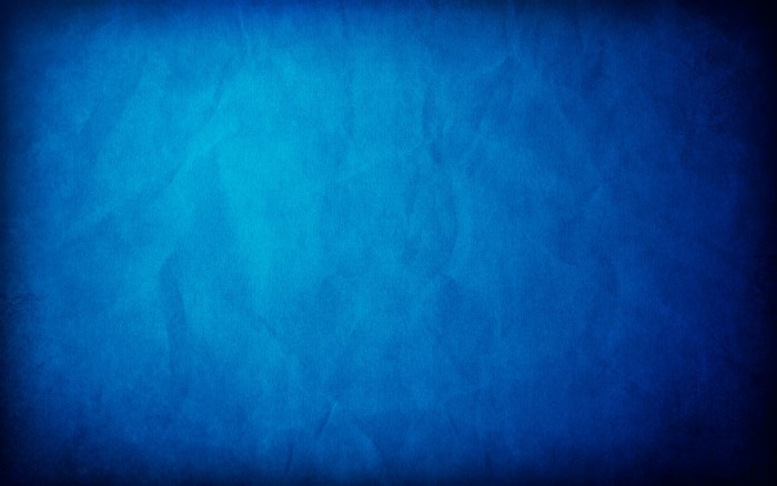 Blue textured paper with light and shadow