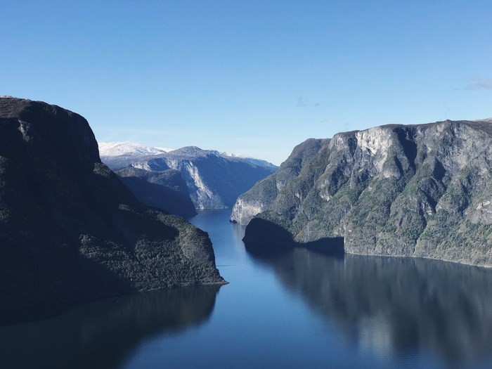 A Fjord with Mountains and Snow