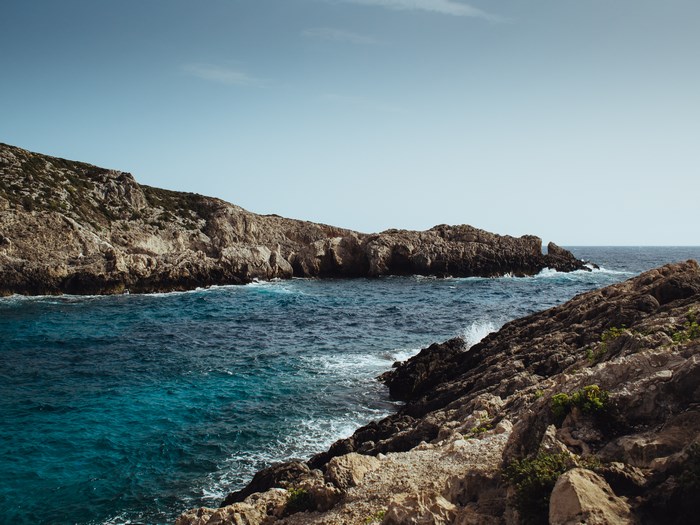 Rugged Mediterranean coast with blue sea and rocky shore