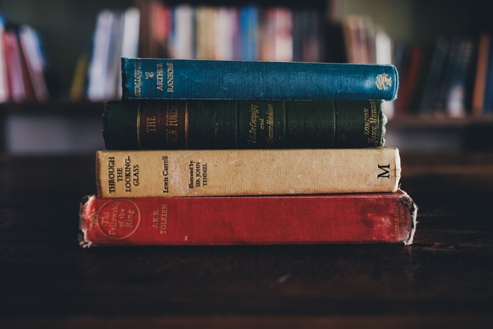 Stack of Classic Books Including Lord of the Rings