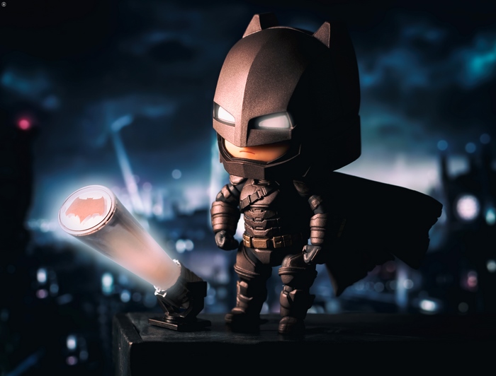 Batman figure with Bat-Signal