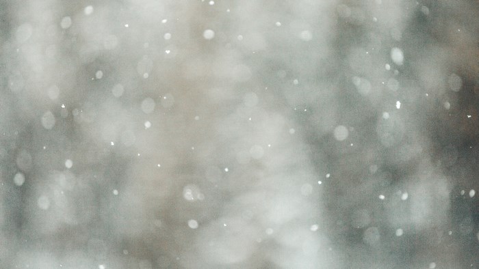 Snowfall with bokeh effect in nature