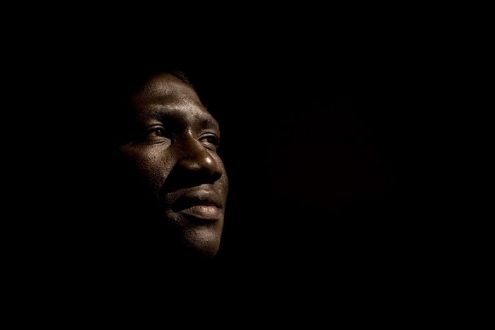 Portrait of an African American man in dark lighting