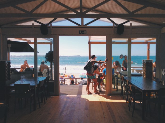 People at a beachside restaurant
