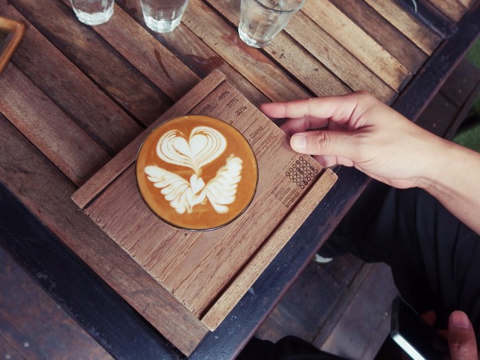 Latte art on a wooden table