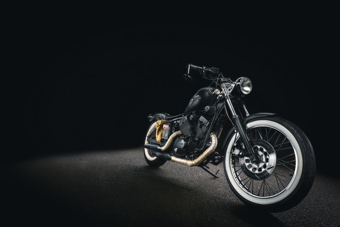 Black cruiser motorcycle with white wall tires