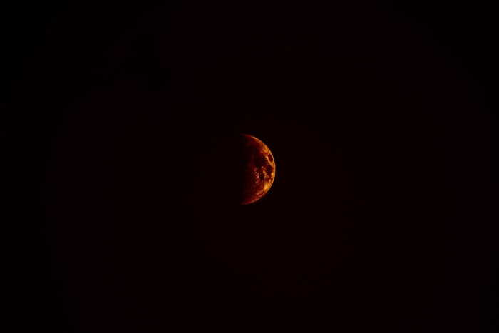 Half moon in dark sky