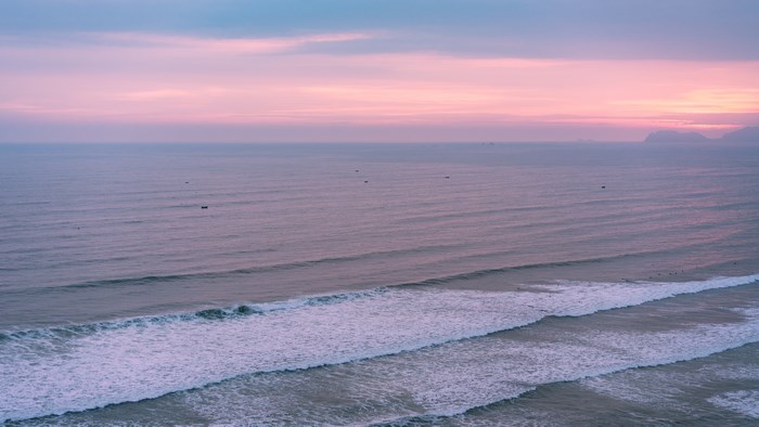 Ocean waves at sunrise or sunset in Peru