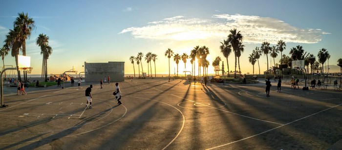Basketball court at Venice Beach during sunset