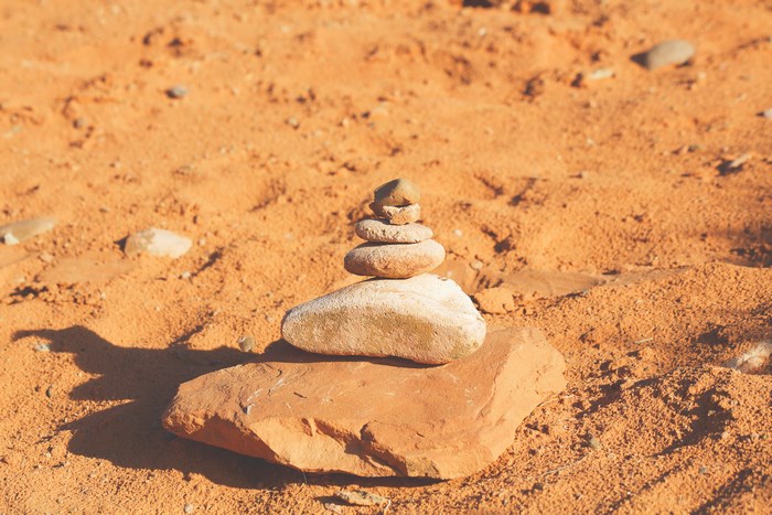 Stack of stones on sandy ground