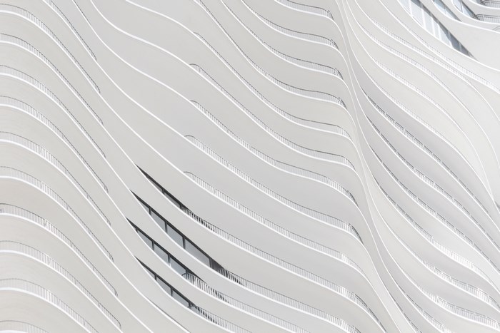 Modern Architecture with Wavy Balconies and Windows