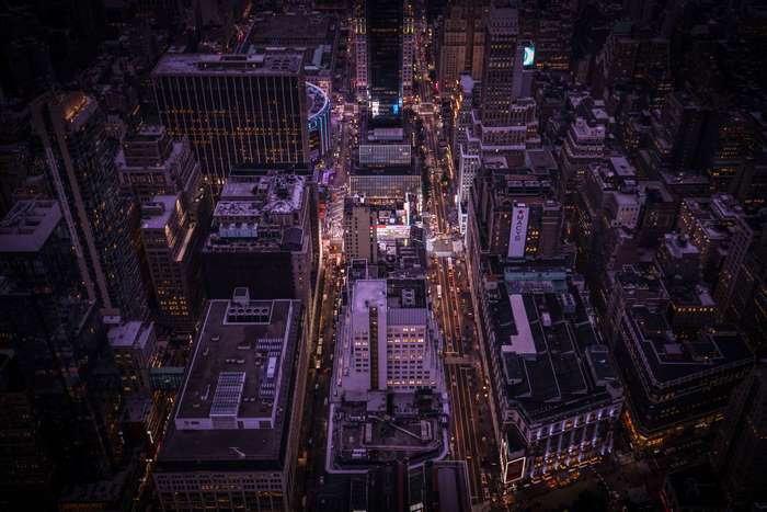 Aerial view of New York City skyscrapers at night
