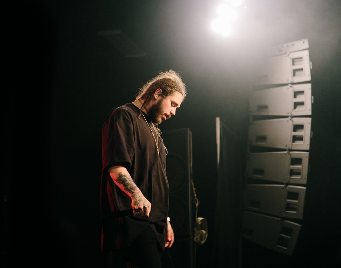 Post Malone performing music