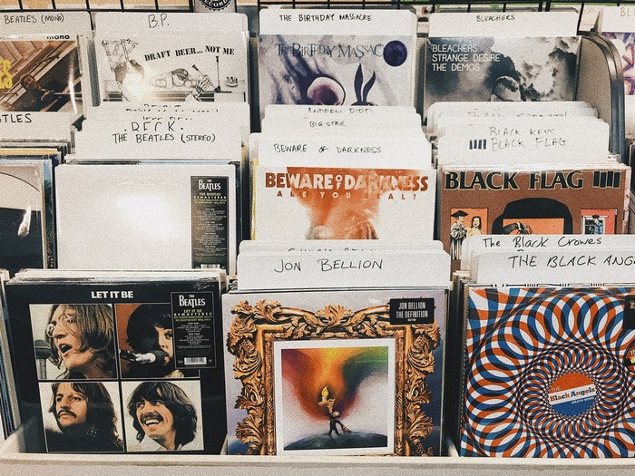 Vinyl record store with albums by The Beatles and Black Flag