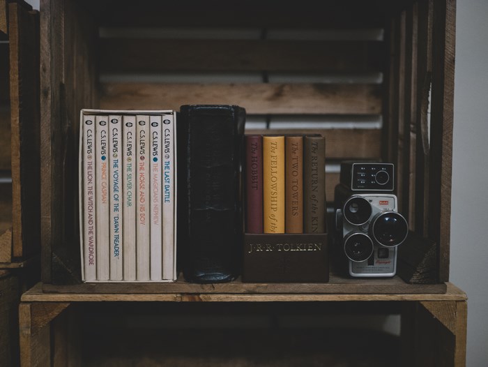 C.S. Lewis and J.R.R. Tolkien Books with Film Camera