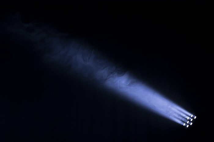 Bright Spotlight Beam Cutting Through Fog