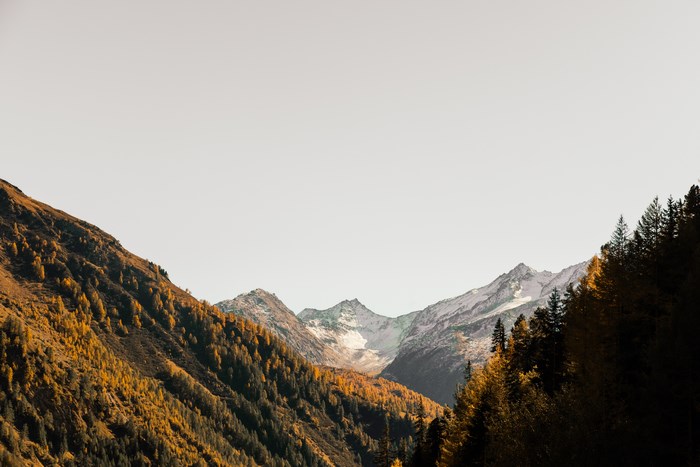 Autumn mountain range with snow-capped peaks in Switzerland