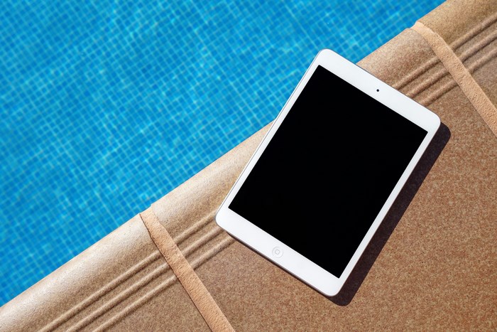 White iPad on a Pool Deck