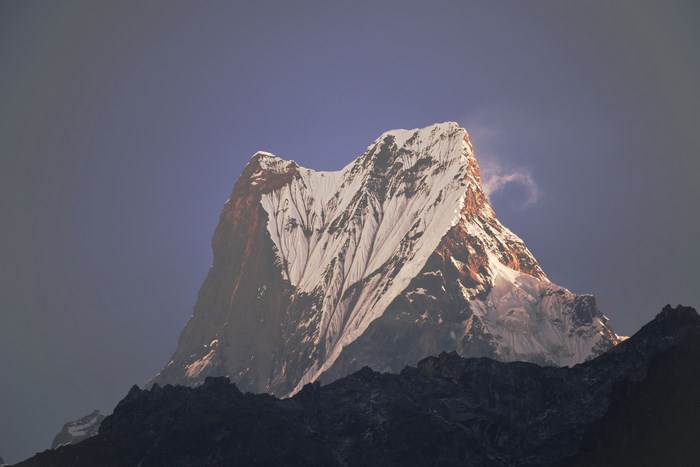 Machhapuchhre mountain peak in Nepal during sunset