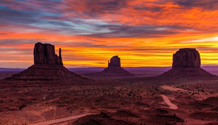 Monument Valley rock formations at sunset