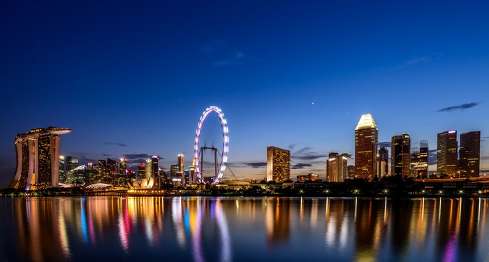 Singapore skyline with Marina Bay Sands and Singapore Flyer at blue hour