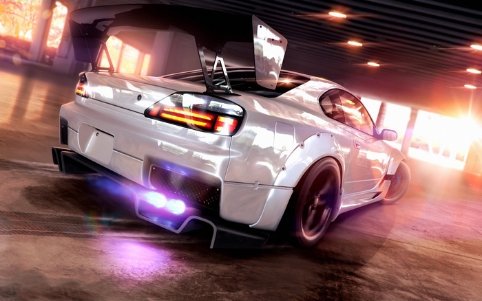 Modified white Nissan S-chassis car with large spoiler