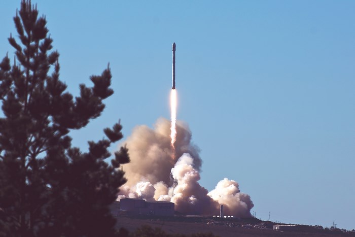 SpaceX Falcon 9 Rocket Launch with Smoke