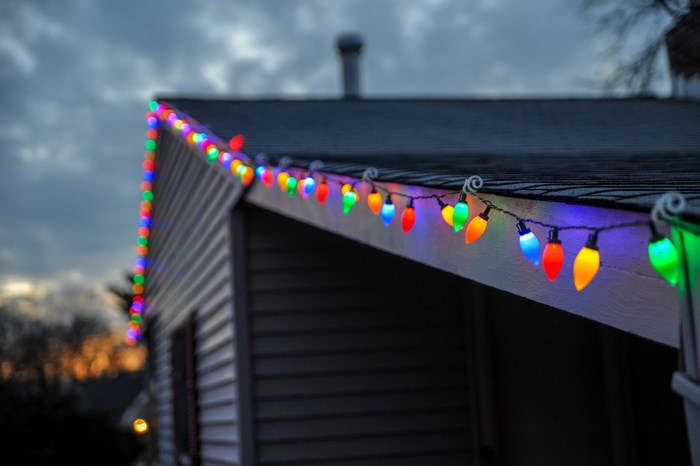 Colorful Christmas lights on a house roof