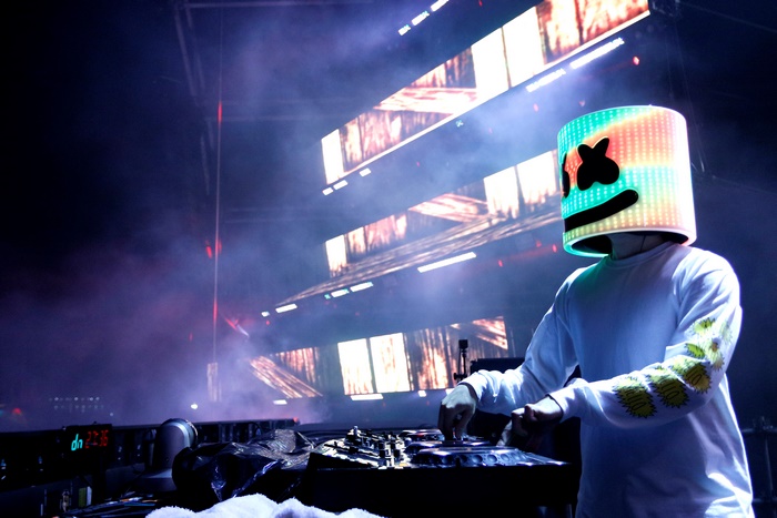 DJ Marshmello performing live with LED mask