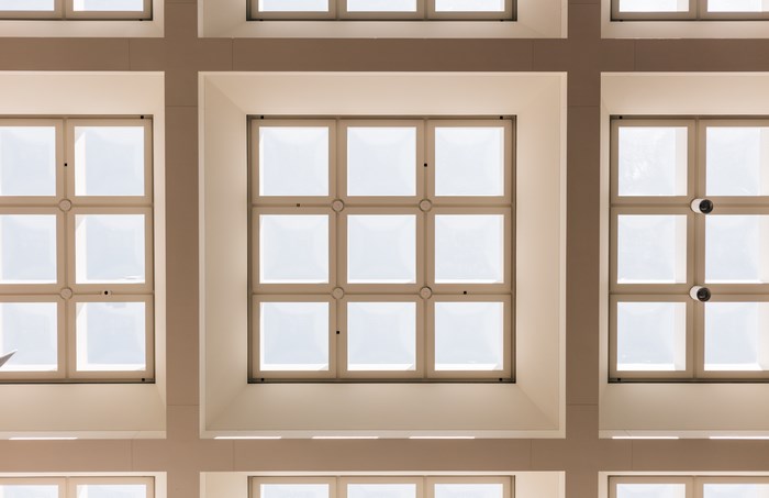 Modern grid skylight ceiling with natural light