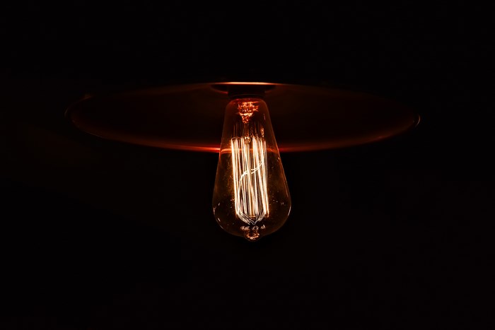 Close-up of a glowing Edison light bulb