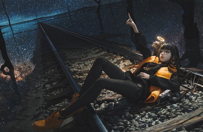 Girl with cat on train tracks under starry sky