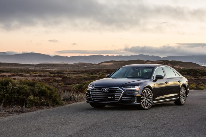 Black Audi A8 Luxury Sedan on a Coastal Road