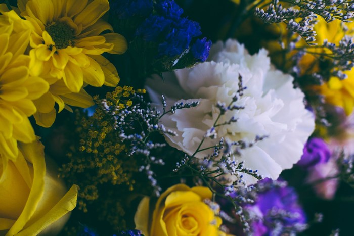 Vibrant Bouquet of Yellow, White, and Purple Flowers