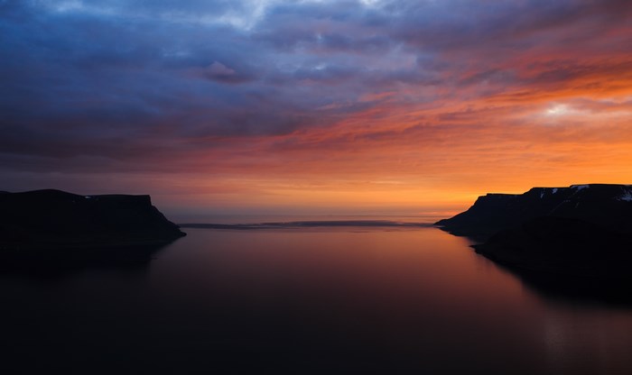 Sunset over Westfjords, Iceland with dramatic clouds