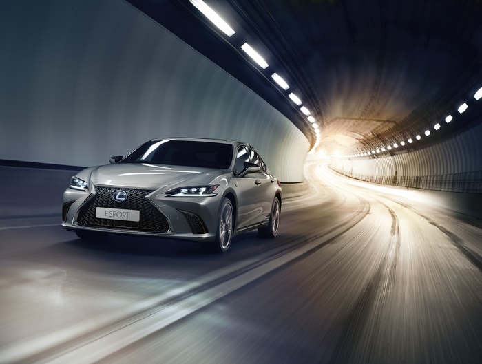 Silver Lexus ES 300H F Sport driving through a tunnel