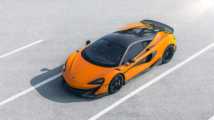 Orange McLaren 600LT Supercar on Asphalt