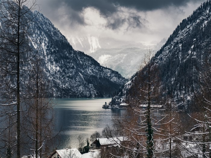 Snowy Mountains Overlooking a Lake in Upper Austria